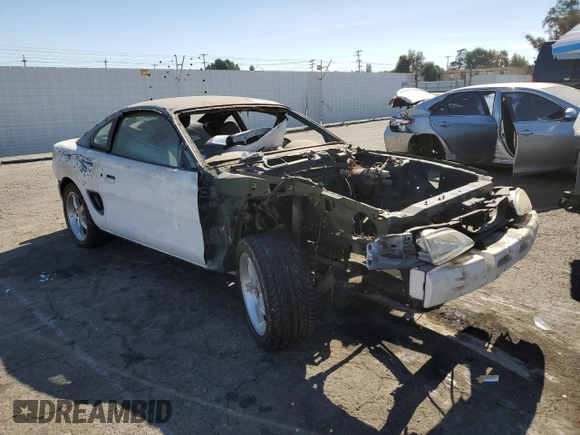 1995 Ford Mustang GT with VIN 1FALP42T7SF174211, listed as a Copart auction lot 77635124 with 158,940 mi miles and Salvage title. Bid and sale history available at DreamBid. Image 4.