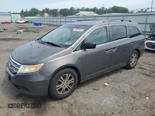 2013 Honda Odyssey EX-L with VIN 5FNRL5H63DB054632, listed as a Copart auction lot 66899635 with 236,124 mi miles and Clean title. Bid and sale history available at DreamBid. Image 1.