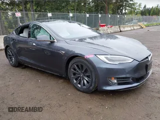 2017 Tesla Model S 100D with VIN 5YJSA1E26HF224568, listed as a IAAI auction lot 42140201 with 102,403 mi miles. Bid and sale history available at carsss.com. Image 1.