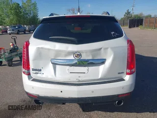 2012 Cadillac SRX Performance Collection z VIN 3GYFNEE30CS652829, wystawiony jako IAAI lot #42156961 z przebiegiem 106 473 mil mil oraz . Historia ofert i sprzedaży dostępna na DreamBid. Obrazek 16.