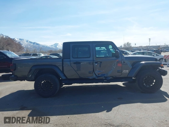 2021 Jeep Gladiator Overland z VIN 1C6HJTFG3ML588042, wystawiony jako IAAI lot #41730427 z przebiegiem 22 344 mil mil oraz . Historia ofert i sprzedaży dostępna na DreamBid. Obrazek 14.