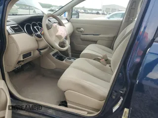 2009 Nissan Versa S with VIN 3N1BC11E19L433572, listed as a Copart auction lot 54084215 with 144,178 mi miles and Salvage title. Bid and sale history available at DreamBid. Image 7.