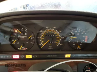 1990 Mercedes-Benz 560 with VIN WDBCA39E7LA517710, listed as a Copart auction lot 85307074 with 225,233 mi miles and Salvage Title. Bid and sale history available at DreamBid. Image 9.