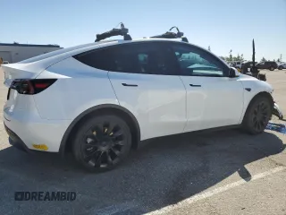2022 Tesla Model Y Long Range with VIN 7SAYGDEE4NF357428, listed as a Copart auction lot 50345715 with 45,168 mi miles and Salvage Title. Bid and sale history available at carsss.com. Image 3.
