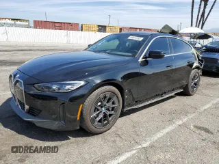 2023 BMW i4 eDrive40 with VIN WBY73AW04PFP08020, listed as a Copart auction lot 48641354 with 14,969 mi miles. Bid and sale history available at carsss.com. Image 1.