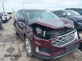 2022 Ford Edge Titanium with VIN 2FMPK4K98NBA38699, listed as a IAAI auction lot 42478069 with Not provided miles and . Bid and sale history available at DreamBid. Image 1.