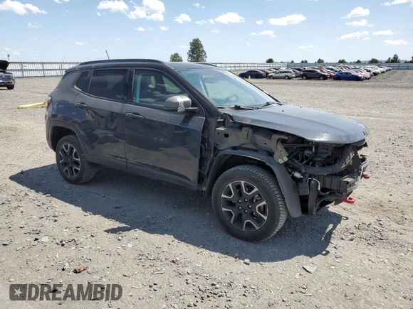 2018 Jeep Compass Trailhawk with VIN 3C4NJDDBXJT484835, listed as a Copart auction lot 61542415 with 59,389 mi miles and Salvage title. Bid and sale history available at DreamBid. Image 4.