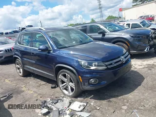 2016 Volkswagen Tiguan SE with VIN WVGAV7AX0GW606895, listed as a IAAI auction lot 42187340 with 165,891 mi miles and . Bid and sale history available at DreamBid. Image 1.