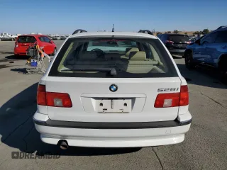 1999 BMW 5 Series 528iAt with VIN WBADP6330XBV61784, listed as a Copart auction lot 77685734 with 210,383 mi miles and Salvage Title. Bid and sale history available at carsss.com. Image 6.