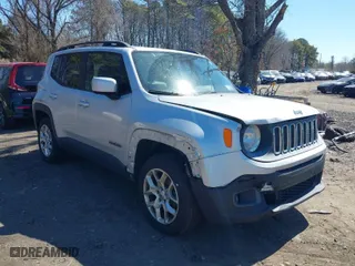 2015 Jeep Renegade Latitude with VIN ZACCJBBTXFPC40947, listed as a IAAI auction lot 41910717 with 135,537 mi miles. Bid and sale history available at carsss.com. Image 6.