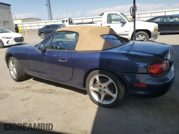 2002 Mazda MX-5 Miata Cloth z VIN JM1NB353220222868, wystawiony jako Copart lot #59944345 z przebiegiem 159 595 mil mil oraz Szkoda całkowita • Salvage title. Historia ofert i sprzedaży dostępna na DreamBid. Obrazek 2.