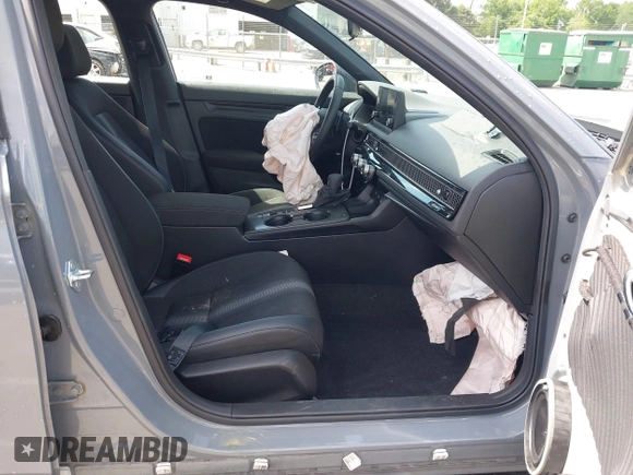 2025 Honda Civic Sport z VIN 2HGFE2F59SH542403, wystawiony jako IAAI lot #42064327 z przebiegiem 12 352 mil mil oraz . Historia ofert i sprzedaży dostępna na DreamBid. Obrazek 5.