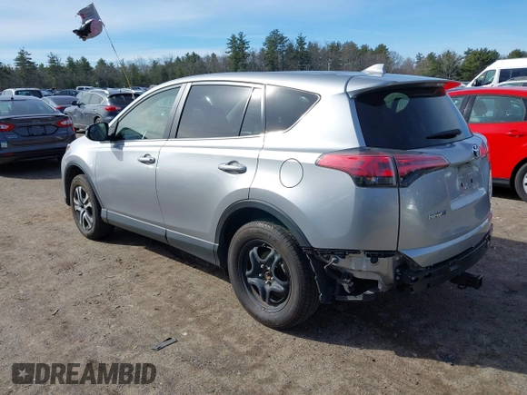 2018 Toyota RAV4 LE with VIN JTMBFREV8JJ224872, listed as a IAAI auction lot 41907962 with 104,605 mi miles and . Bid and sale history available at DreamBid. Image 3.