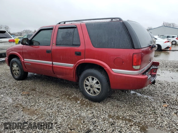 2000 GMC Jimmy SLE Convenience z VIN 1GKDT13W0Y2273829, wystawiony jako Copart lot #84811284 z przebiegiem 129 635 mil mil oraz Szkoda całkowita • Salvage title. Historia ofert i sprzedaży dostępna na DreamBid. Obrazek 2.