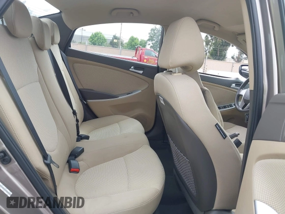 2014 Hyundai Accent GLS z VIN KMHCT4AE4EU758926, wystawiony jako IAAI lot #42451816 z przebiegiem 80 387 mil mil oraz . Historia ofert i sprzedaży dostępna na DreamBid. Obrazek 8.