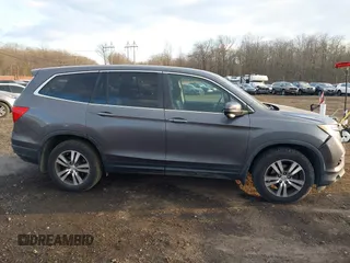 2016 Honda Pilot EX-L with VIN 5FNYF6H75GB053780, listed as a IAAI auction lot 41340590 with 203,190 mi miles. Bid and sale history available at carsss.com. Image 13.