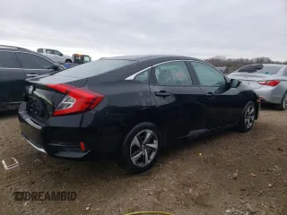 2019 Honda Civic LX with VIN 19XFC2F6XKE004169, listed as a Copart auction lot 83847414 with 65,517 mi miles and Salvage Title. Bid and sale history available at DreamBid. Image 3.