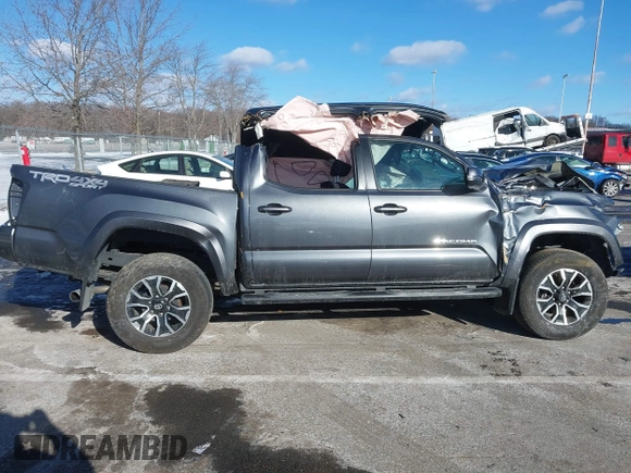 2023 Toyota Tacoma SR with VIN 3TMCZ5AN9PM574534, listed as a IAAI auction lot 41167910 with 27,375 mi miles and . Bid and sale history available at DreamBid. Image 12.