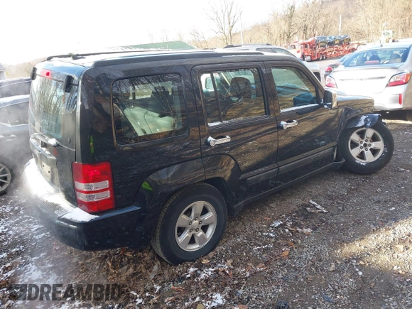 2012 Jeep Liberty Sport with VIN 1C4PJMAK0CW209498, listed as a IAAI auction lot 41881406 with 127,855 mi miles. Bid and sale history available at carsss.com. Image 4.