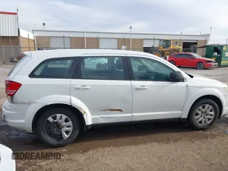2014 Dodge Journey American Value with VIN 3C4PDCAB1ET209973, listed as a IAAI auction lot 41803864 with 168,774 mi miles and . Bid and sale history available at DreamBid. Image 13.