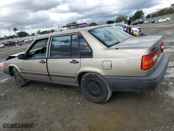 1994 Volvo 900 Action with VIN YV1JS8312R1167902, listed as a Copart auction lot 48956885 with 197,200 mi miles and Salvage Title. Bid and sale history available at carsss.com. Image 2.