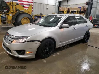 2012 Ford Fusion Hybrid с VIN 3FADP0L33CR257456, выставлен на аукционе Copart как лот 53976165 с пробегом 219 218 миль миль и Чистый • Clean title. История ставок и продаж доступна на DreamBid. Изображение 1.