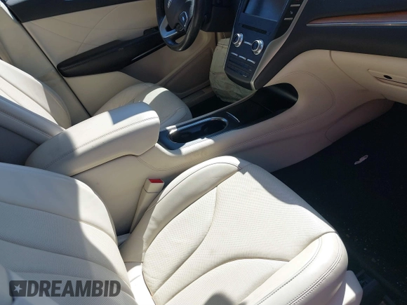 2015 Lincoln MKC with VIN 5LMTJ2AH8FUJ31911, listed as a IAAI auction lot 41735017 with 76,332 mi miles. Bid and sale history available at carsss.com. Image 5.