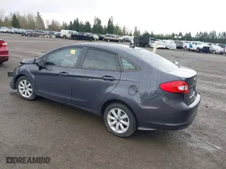 2012 Ford Fiesta SE with VIN 3FADP4BJXCM216102, listed as a IAAI auction lot 41903721 with 125,760 mi miles. Bid and sale history available at carsss.com. Image 3.