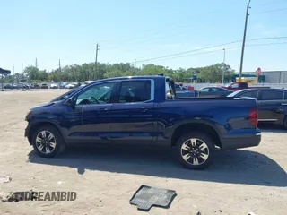 2020 Honda Ridgeline RTL with VIN 5FPYK3F56LB028917, listed as a IAAI auction lot 42280770 with 17,598 mi miles and . Bid and sale history available at DreamBid. Image 14.