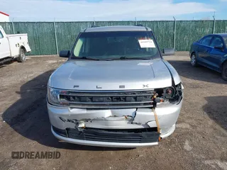 2016 Ford Flex SE z VIN 2FMGK5B8XGBA23900, wystawiony jako IAAI lot #41599714 z przebiegiem 102 961 mil mil oraz . Historia ofert i sprzedaży dostępna na DreamBid. Obrazek 12.