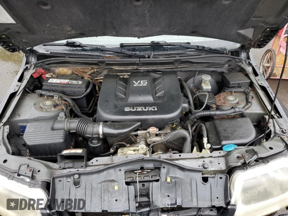 2006 Suzuki Grand Vitara Luxury with VIN JS3TD947364101307, listed as a Copart auction lot 55037585 with 198,616 mi miles and Salvage title. Bid and sale history available at DreamBid. Image 12.