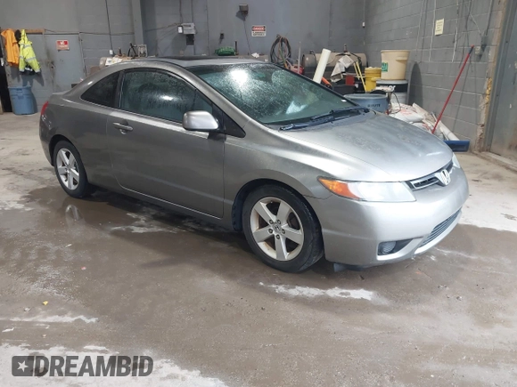 2008 Honda Civic Cpe EX with VIN 2HGFG12878H559388, listed as a IAAI auction lot 42184557 with 164,412 mi miles. Bid and sale history available at carsss.com. Image 1.