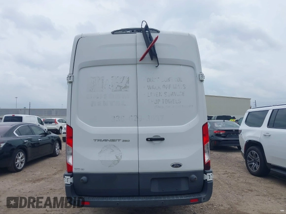 2018 Ford Transit z VIN 1FTBW3XMXJKB24221, wystawiony jako IAAI lot #42425978 z przebiegiem 77 666 mil mil oraz . Historia ofert i sprzedaży dostępna na DreamBid. Obrazek 17.