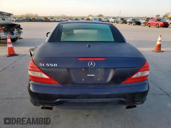 2009 Mercedes-Benz SL 550 z VIN WDBSK71F69F142599, wystawiony jako Copart lot #50241095 z przebiegiem 58 416 mil mil oraz Szkoda całkowita • Salvage title. Historia ofert i sprzedaży dostępna na DreamBid. Obrazek 6.