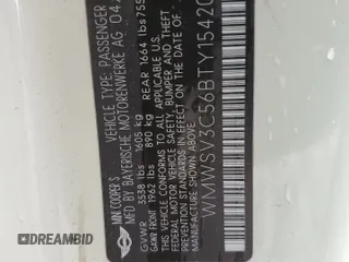 2011 MINI Hardtop S with VIN WMWSV3C56BTY15420, listed as a Copart auction lot 58050875 with 162,145 mi miles and Salvage title. Bid and sale history available at DreamBid. Image 12.