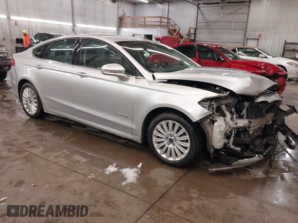 2016 Ford Fusion SE Hybrid z VIN 3FA6P0LU1GR304166, wystawiony jako IAAI lot #41932720 z przebiegiem 68 058 mil mil oraz . Historia ofert i sprzedaży dostępna na DreamBid. Obrazek 1.