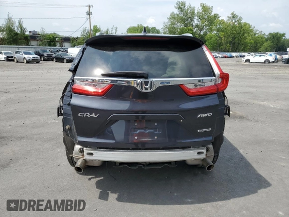 2018 Honda CR-V Touring with VIN 7FARW2H93JE048507, listed as a Copart auction lot 64071705 with 69,051 mi miles and Salvage title. Bid and sale history available at DreamBid. Image 6.