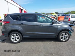 2015 Ford Escape SE with VIN 1FMCU0G75FUB31989, listed as a IAAI auction lot 42040121 with 87,068 mi miles and . Bid and sale history available at DreamBid. Image 14.