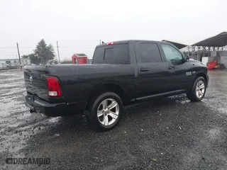 2016 Ram 1500 Sport with VIN 1C6RR6MT7GS241127, listed as a IAAI auction lot 41230712 with 129,586 mi miles. Bid and sale history available at carsss.com. Image 4.