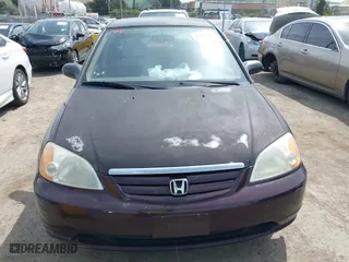 2001 Honda Civic LX with VIN 2HGES165X1H581899, listed as a IAAI auction lot 41989387 with 183,935 mi miles. Bid and sale history available at carsss.com. Image 6.