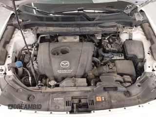 2017 Mazda CX-5 Touring with VIN JM3KFBCL9H0107589, listed as a IAAI auction lot 41241481 with 77,032 mi miles. Bid and sale history available at carsss.com. Image 10.
