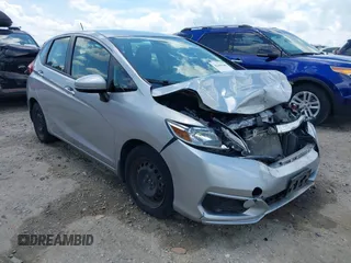 2019 Honda Fit LX with VIN 3HGGK5H49KM725157, listed as a IAAI auction lot 42449360 with 121,359 mi miles and . Bid and sale history available at DreamBid. Image 1.