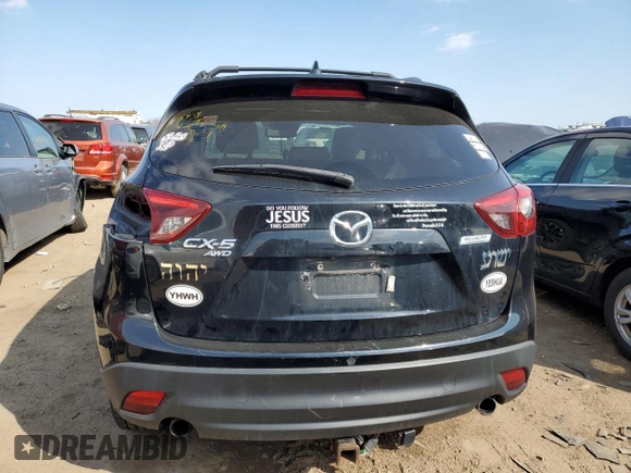 2016 Mazda CX-5 Grand Touring with VIN JM3KE4DY8G0719113, listed as a Copart auction lot 52160285 with 259,365 mi miles and Salvage Title. Bid and sale history available at carsss.com. Image 6.