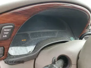 2004 Cadillac DeVille z VIN 1G6KD54Y24U186197, wystawiony jako Copart lot #54191045 z przebiegiem Nie podano mil oraz Szkody całkowita. Historia ofert i sprzedaży dostępna na DreamBid. Obrazek 9.