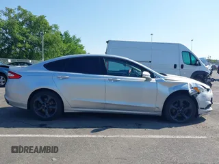 2016 Ford Fusion SE with VIN 3FA6P0T95GR322164, listed as a IAAI auction lot 42553970 with 123,416 mi miles and . Bid and sale history available at DreamBid. Image 13.