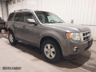 2012 Ford Escape XLT with VIN 1FMCU0D71CKA90823, listed as a IAAI auction lot 41764650 with 65,994 mi miles. Bid and sale history available at carsss.com. Image 1.