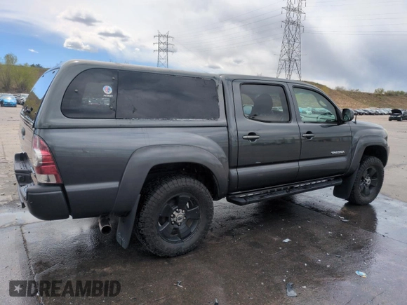 2009 Toyota Tacoma with VIN 3TMLU42N39M024000, listed as a Copart auction lot 55301375 with 210,068 mi miles and Salvage Title. Bid and sale history available at DreamBid. Image 3.
