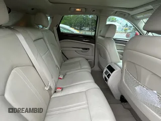 2015 Cadillac SRX Luxury Collection z VIN 3GYFNBE37FS569840, wystawiony jako Copart lot #56965835 z przebiegiem 183 817 mil mil oraz Tytuł czysty. Historia ofert i sprzedaży dostępna na DreamBid. Obrazek 6.