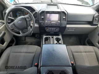 2019 Ford F-150 XL with VIN 1FTEW1EP8KFC61814, listed as a Copart auction lot 57703735 with 105,273 mi miles and Salvage title. Bid and sale history available at DreamBid. Image 8.