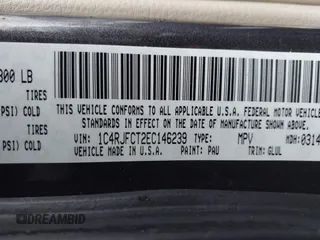2014 Jeep Grand Cherokee Overland with VIN 1C4RJFCT2EC146239, listed as a IAAI auction lot 41368514 with 164,239 mi miles. Bid and sale history available at carsss.com. Image 9.